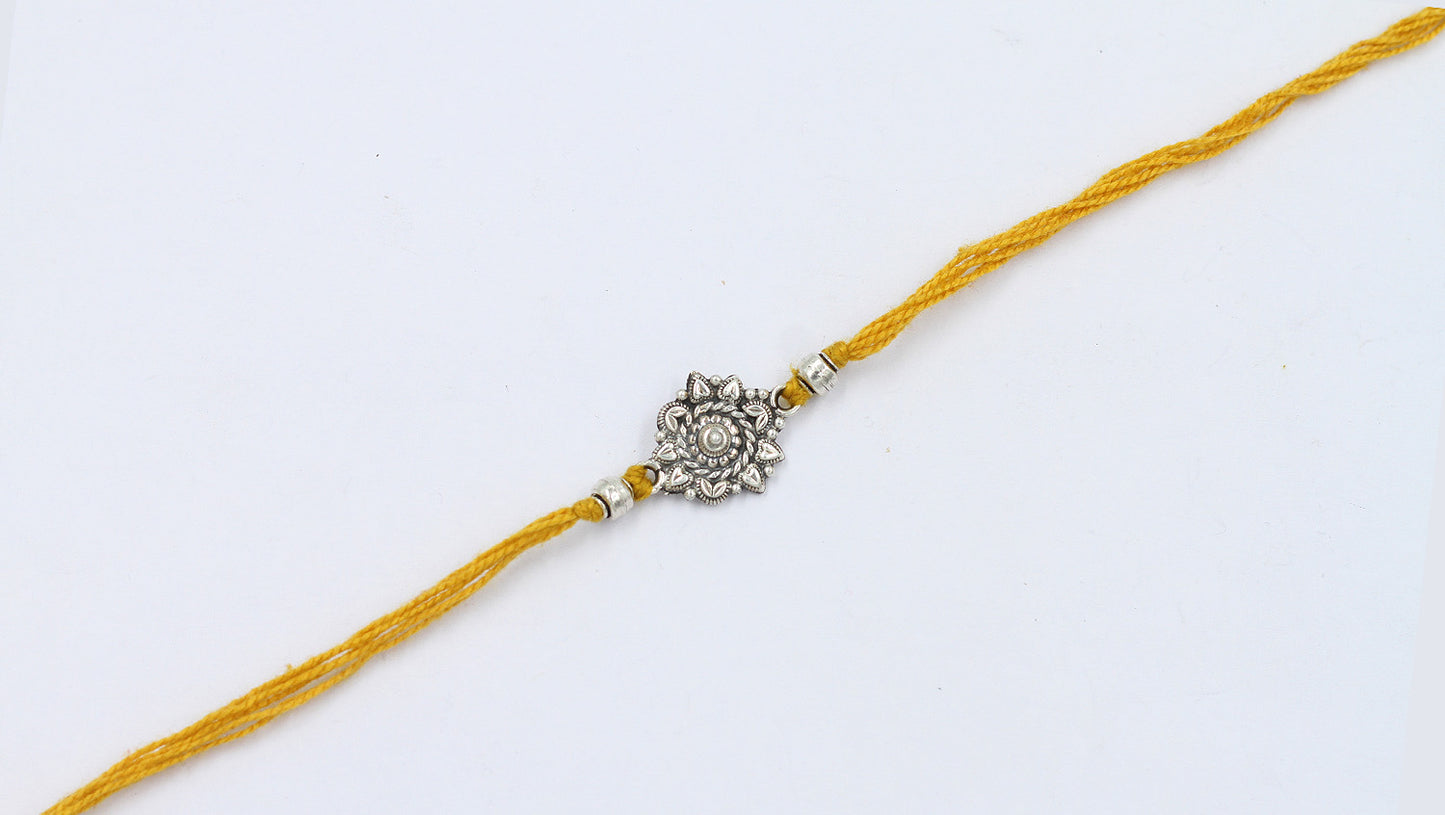 Sangeeta Boochra "925 Sterling Silver Rakhi: Timeless Bond"