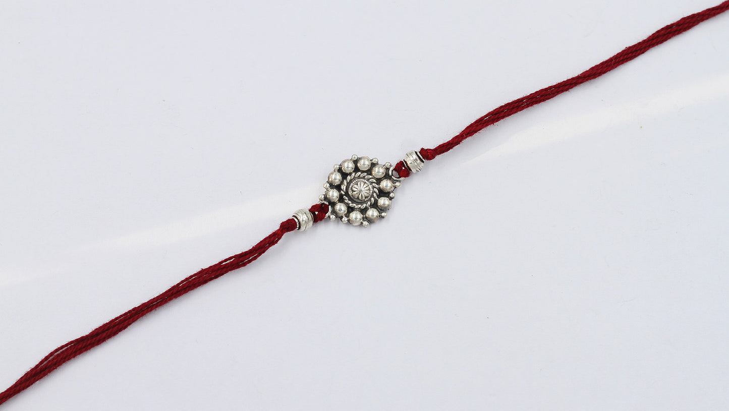 Sangeeta Boochra "925 Sterling Silver Rakhi: Timeless Bond"