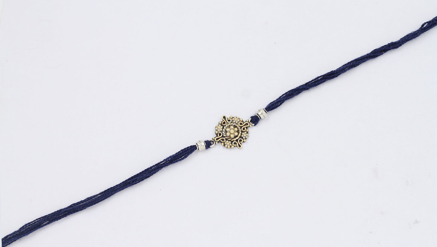 Sangeeta Boochra "925 Sterling Silver Rakhi: Timeless Bond"