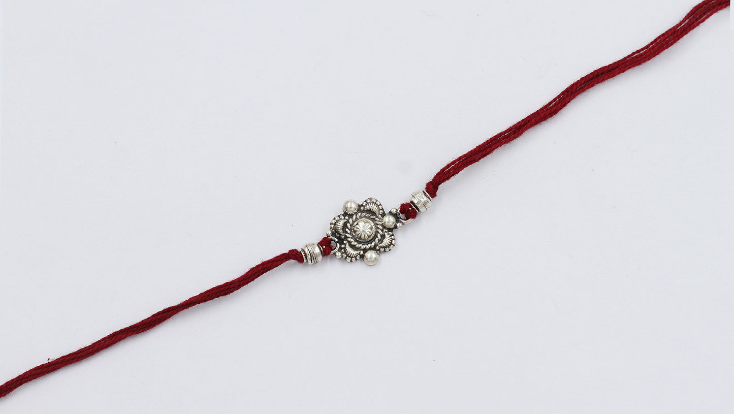 Sangeeta Boochra "925 Sterling Silver Rakhi: Timeless Bond"