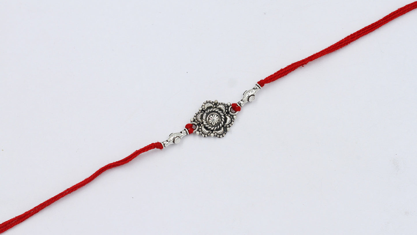 Sangeeta Boochra "925 Sterling Silver Rakhi: Timeless Bond"