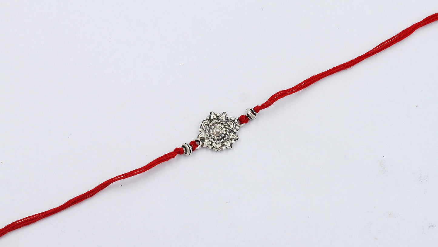 Sangeeta Boochra "925 Sterling Silver Rakhi: Timeless Bond"