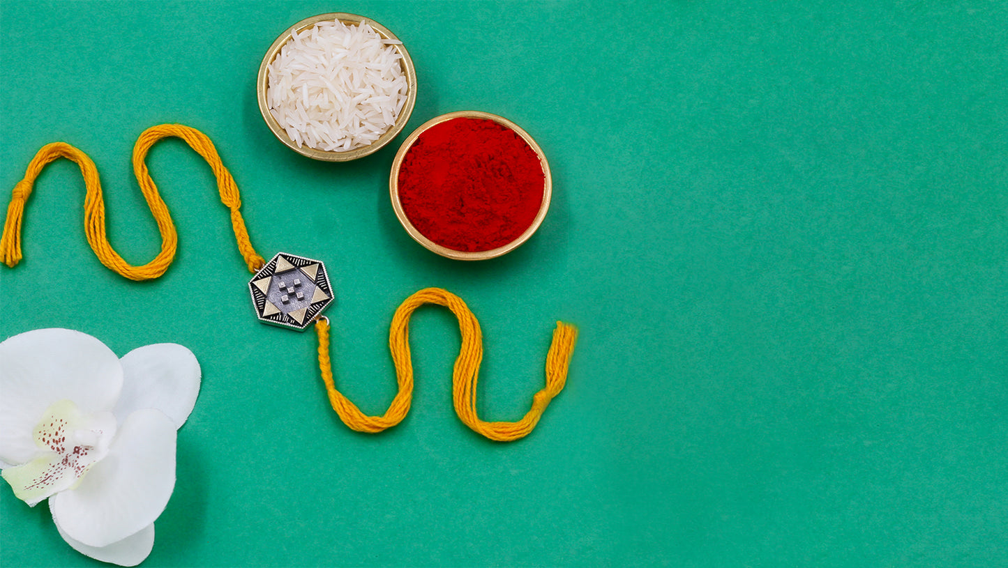 Guardian Geometry Silver Rakhi by Sangeeta Boochra