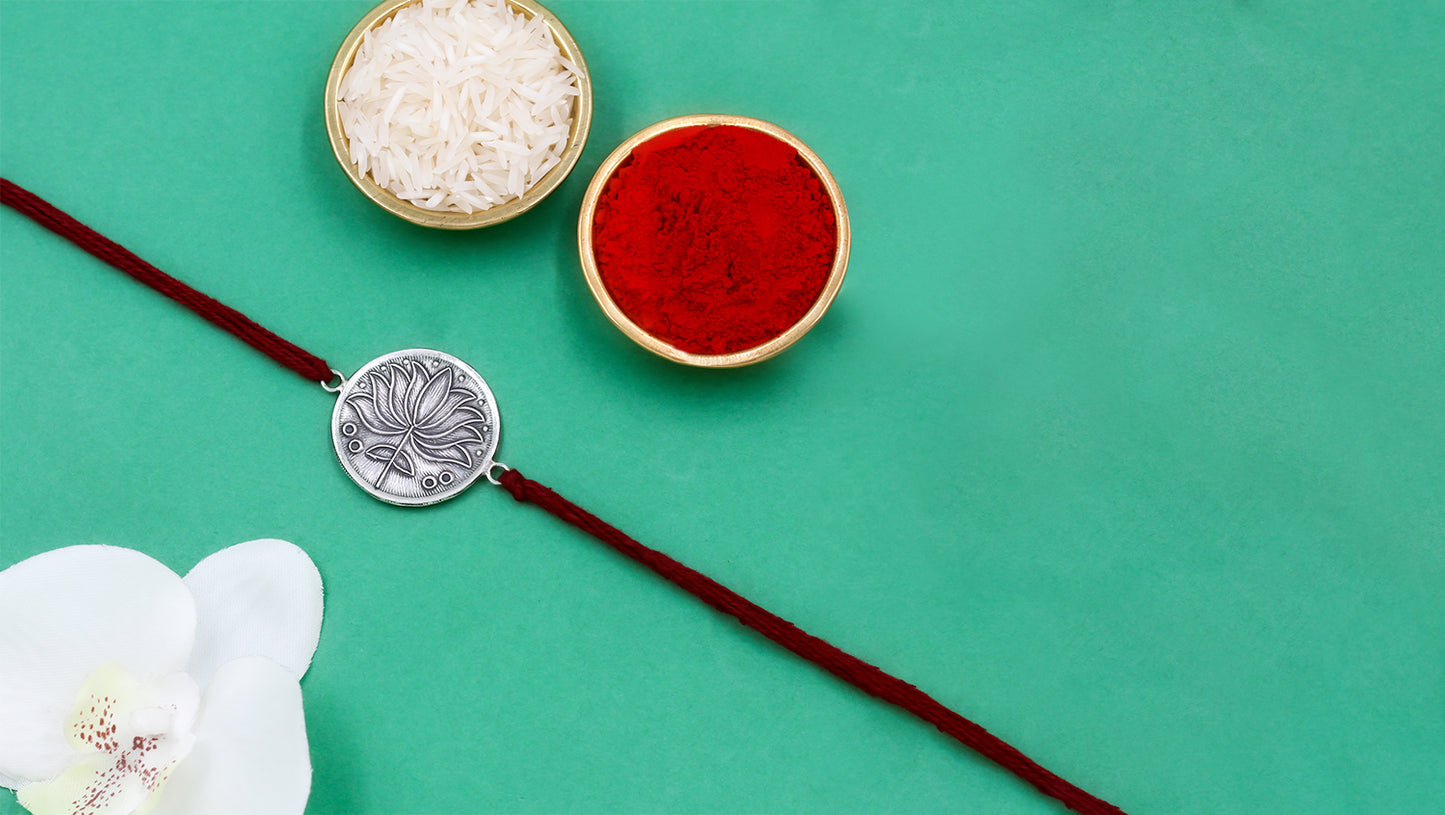 Lotus Legacy Rakhi by Sangeeta Boochra