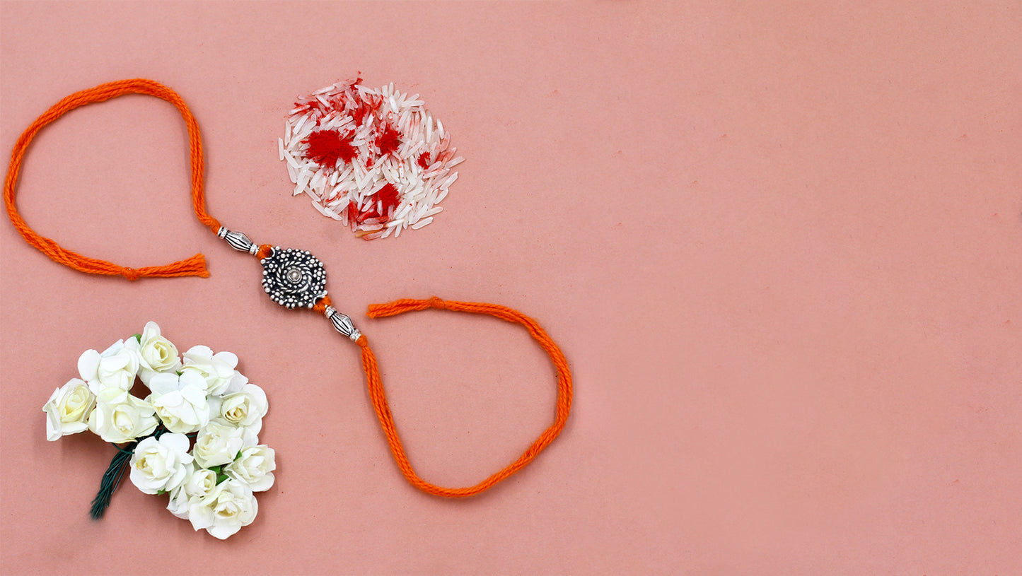 Oxidized Radiance Rakhi by Sangeeta Boochra