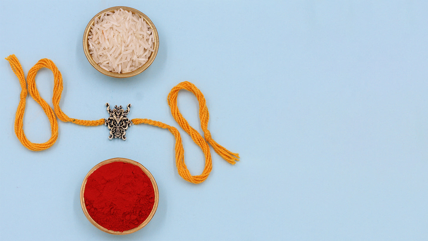 "Regal Crest Silver Rakhi – By Sangeeta Boochra"