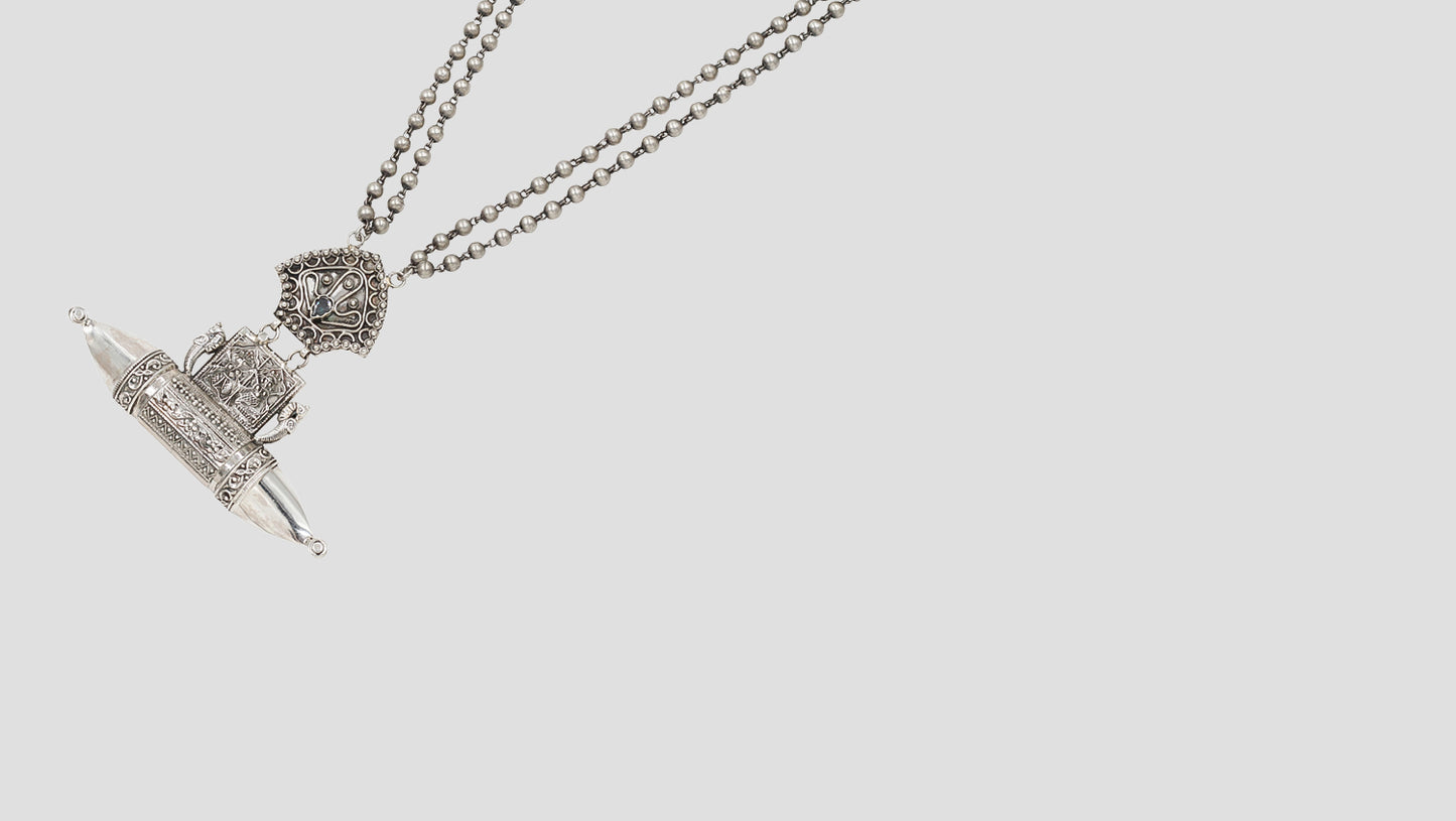 "Heritage Charm: Sangeeta Boochra Handcrafted Silver Pendant"