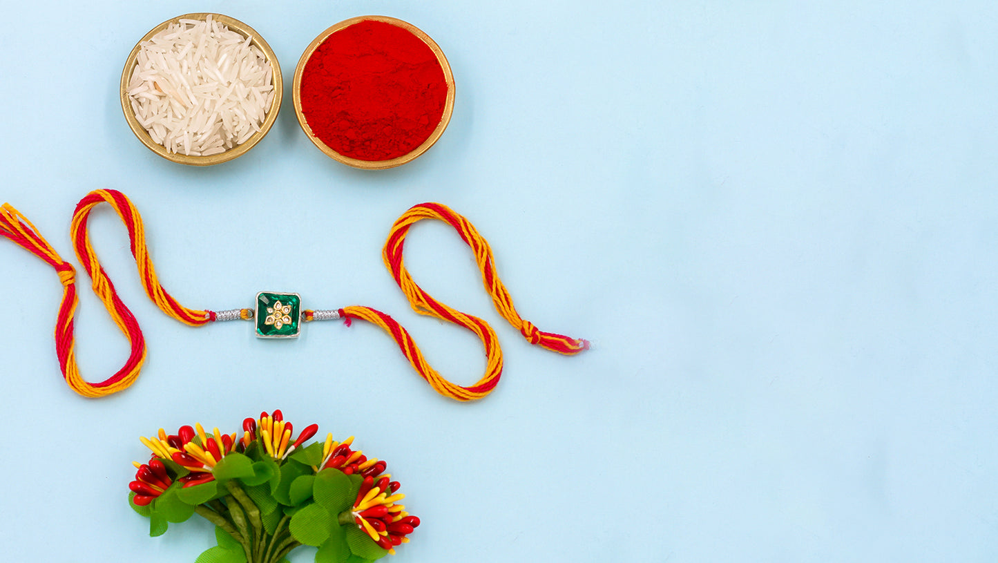 "Emerald Aura Silver Rakhi by Sangeeta Boochra"