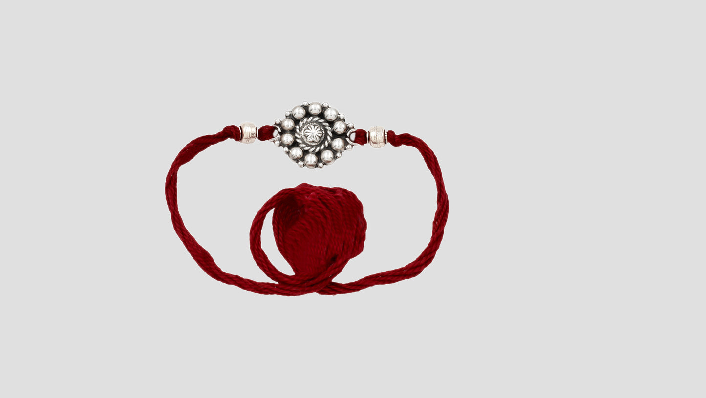 Radiant Bloom Rakhi by Sangeeta Boochra
