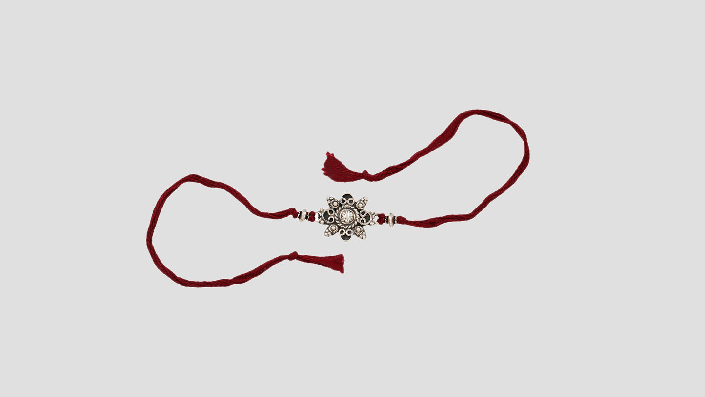 Regal Radiance 925 Silver Rakhi by Sangeeta Boochra