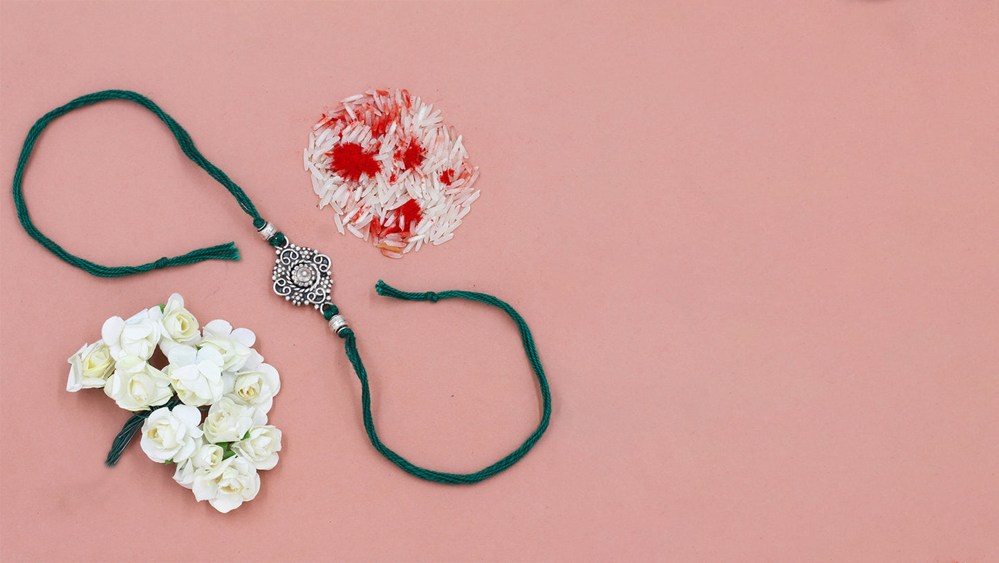 Royal Filigree Rakhi – Handcrafted in Silver