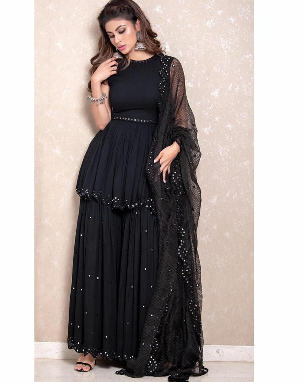 Mouni Roy in Silver Earrings