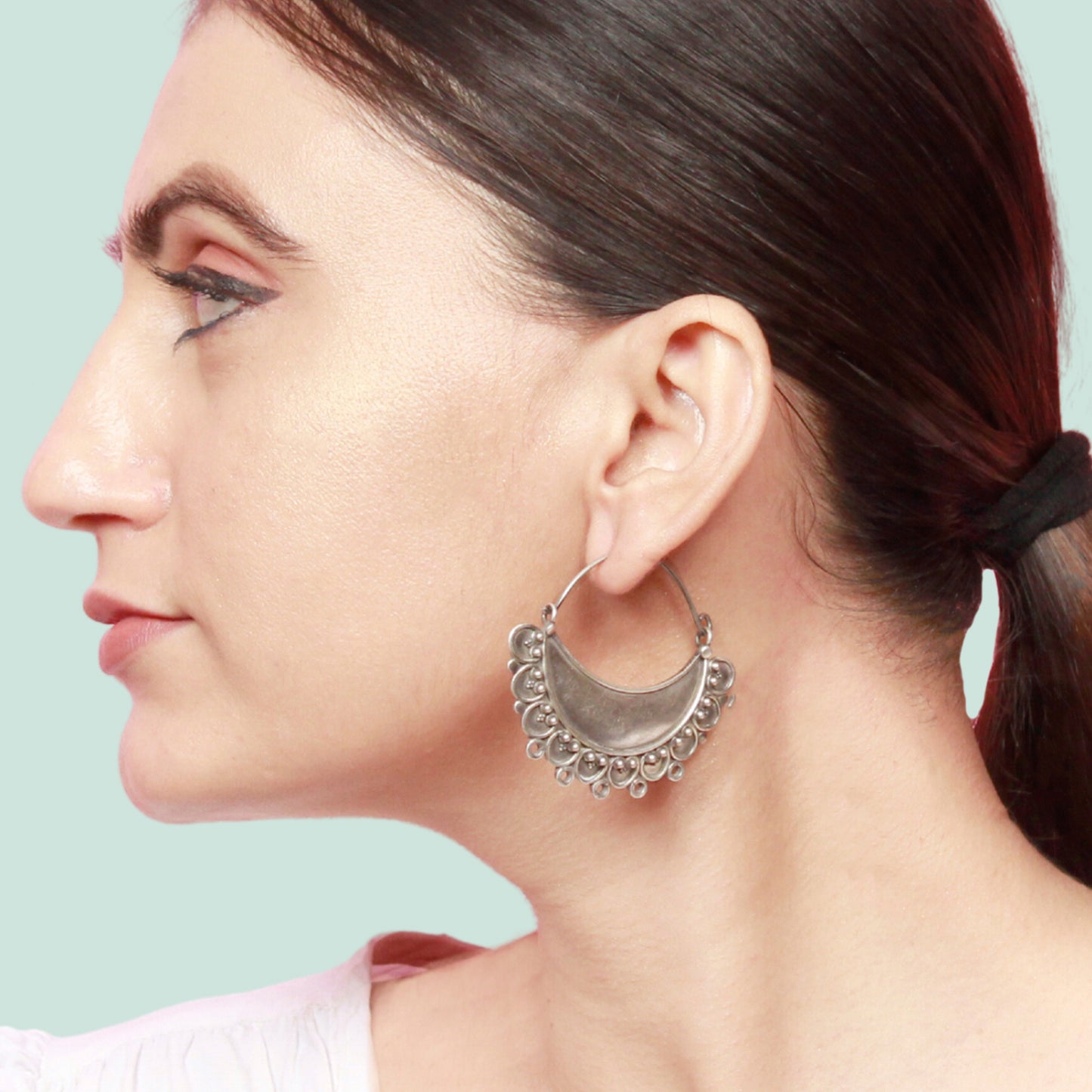 Silver hoop earring half crescent shape