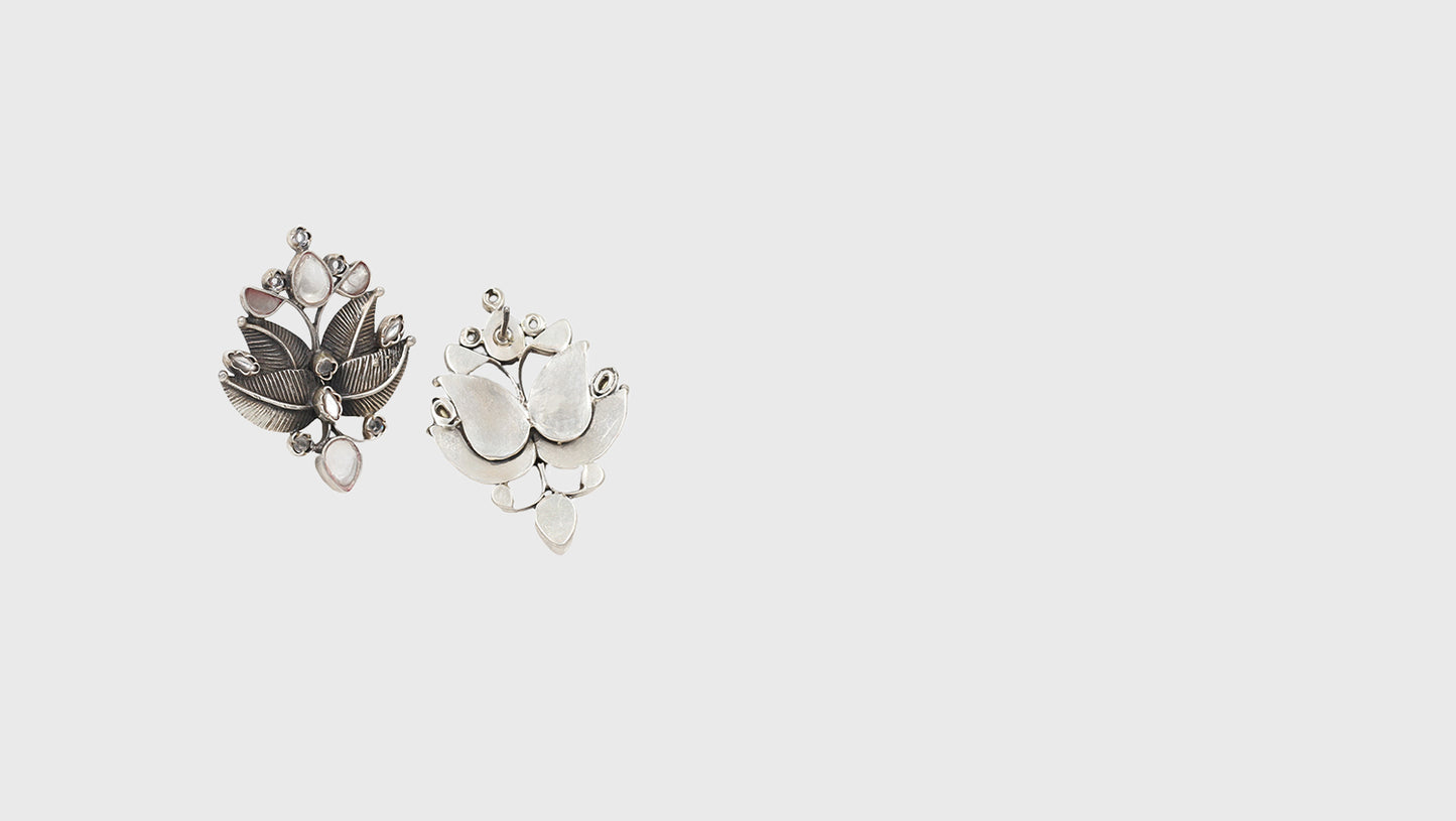 "Elegant Polish: Handcrafted Silver Studs by Sangeeta Boochra "