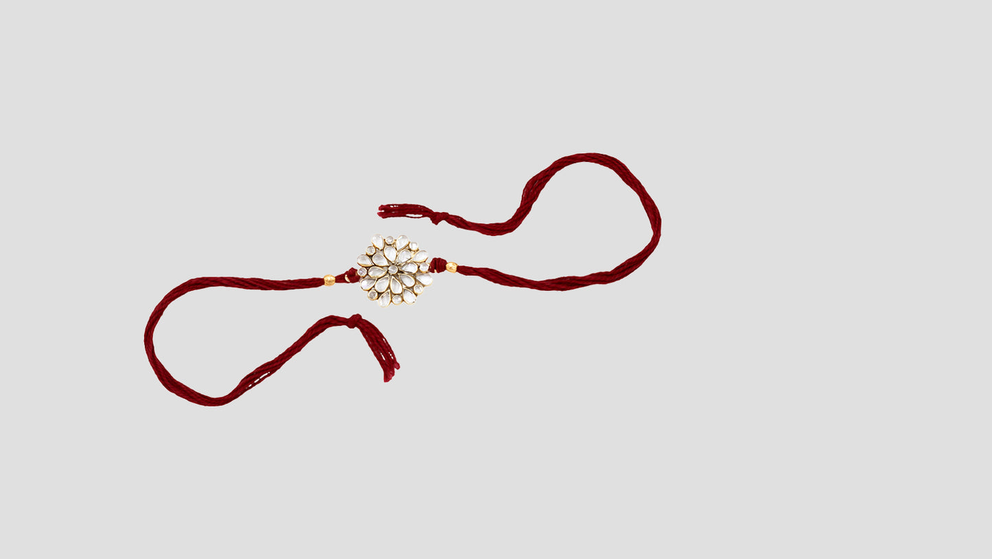 Ethereal Bloom Silver Rakhi by Sangeeta Boochra