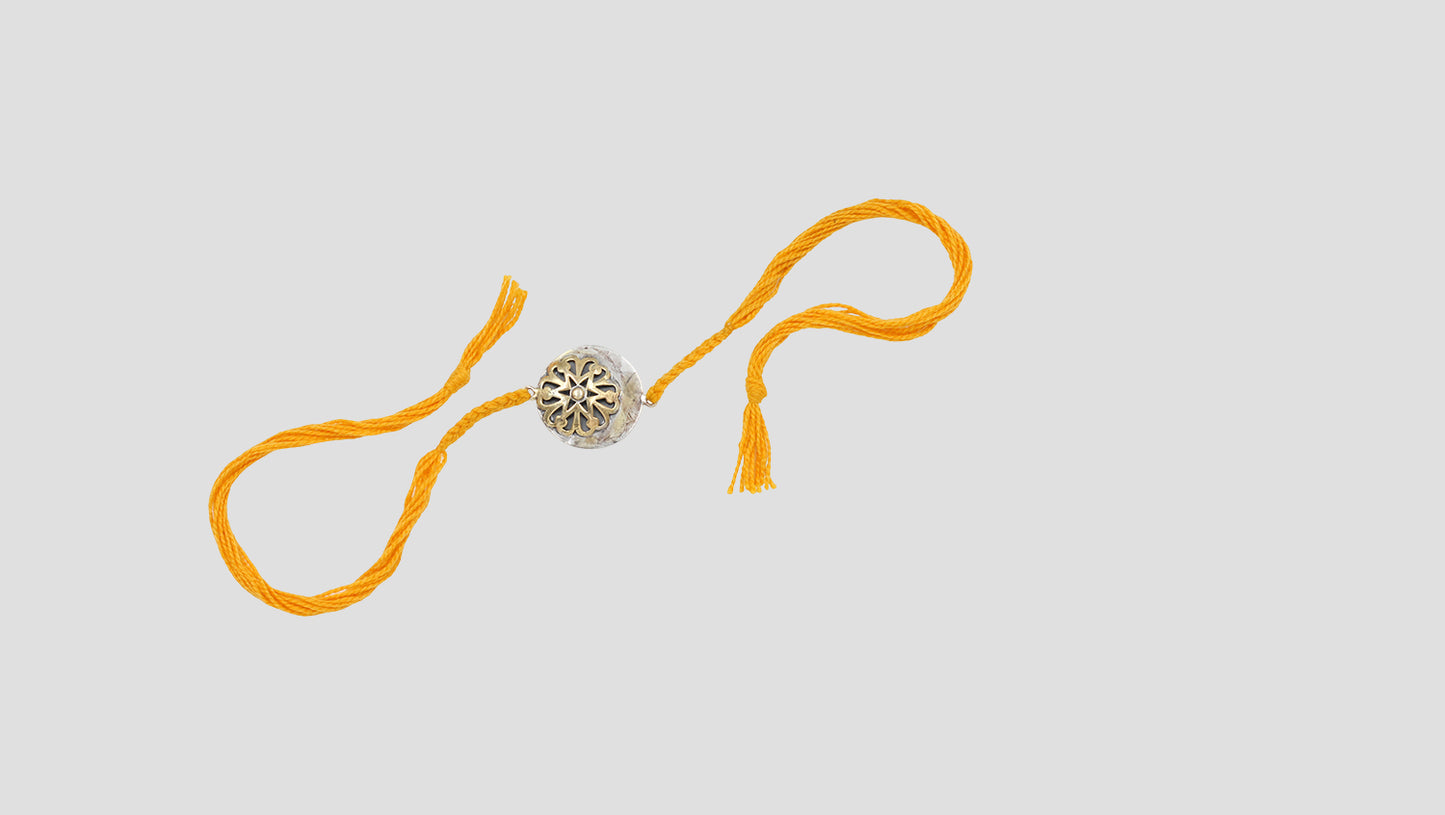 Golden Glow Silver Rakhi By Sangeeta Boochra