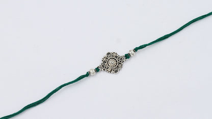 Sangeeta Boochra "925 Sterling Silver Rakhi: Timeless Bond"