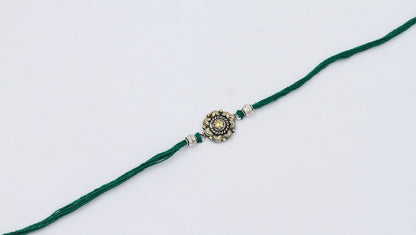 Sangeeta Boochra "925 Sterling Silver Rakhi: Timeless Bond"