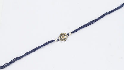 Sangeeta Boochra "925 Sterling Silver Rakhi: Timeless Bond"