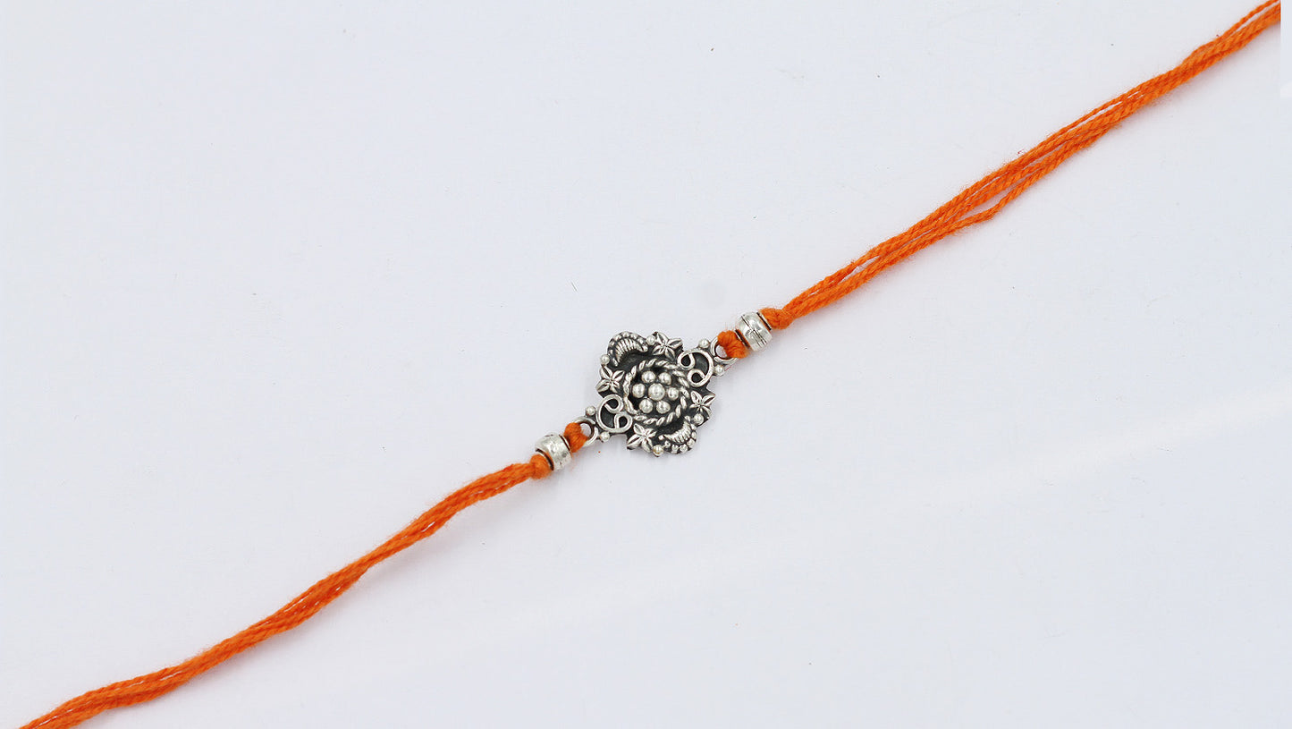 Sangeeta Boochra "925 Sterling Silver Rakhi: Timeless Bond"