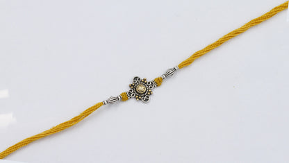 Sangeeta Boochra "925 Sterling Silver Rakhi: Timeless Bond"