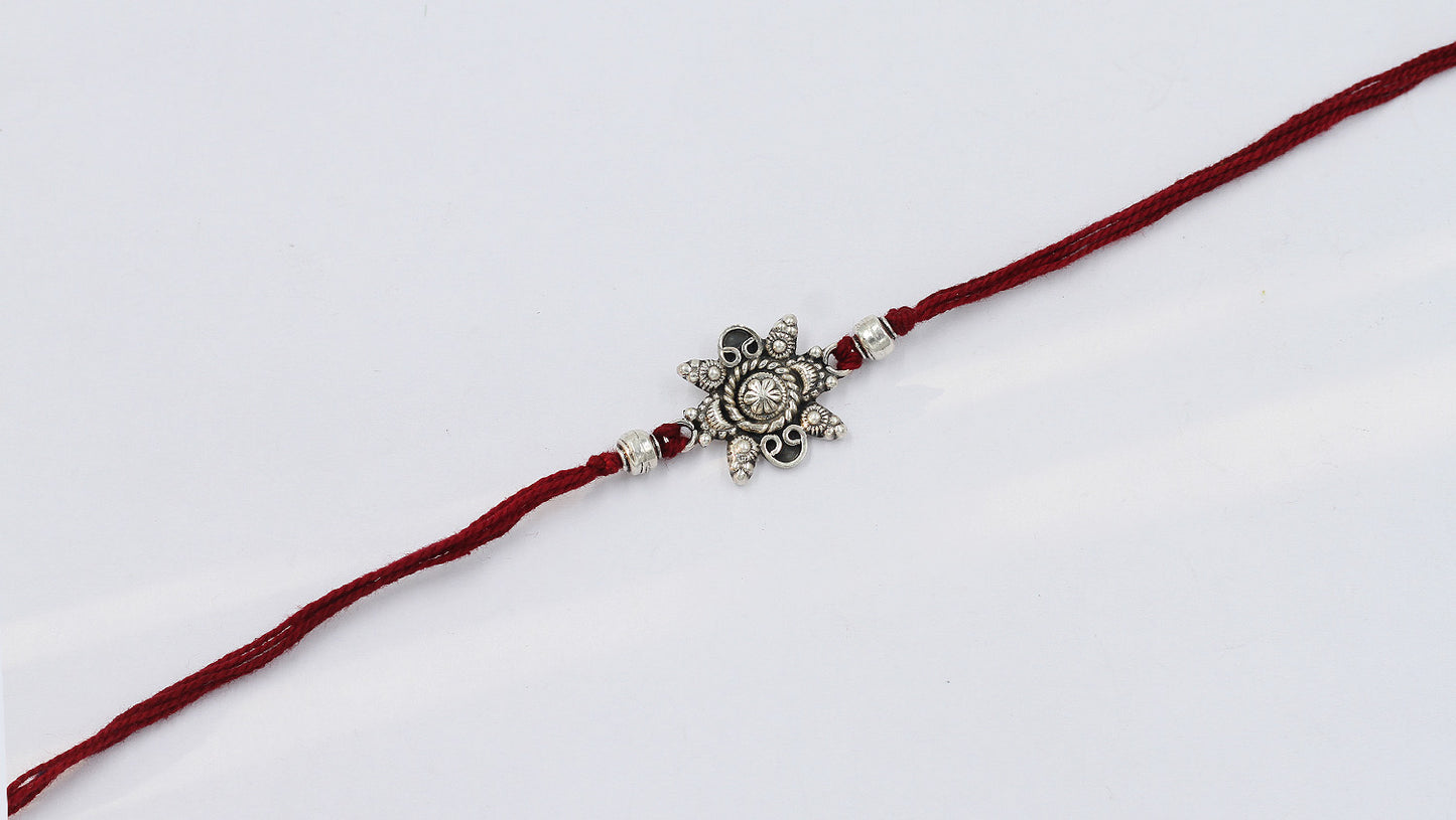 Sangeeta Boochra "925 Sterling Silver Rakhi: Timeless Bond"