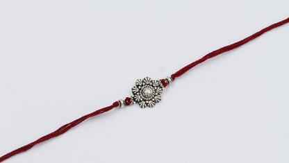 Sangeeta Boochra "925 Sterling Silver Rakhi: Timeless Bond"