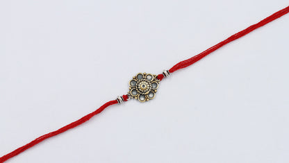 Sangeeta Boochra "925 Sterling Silver Rakhi: Timeless Bond"