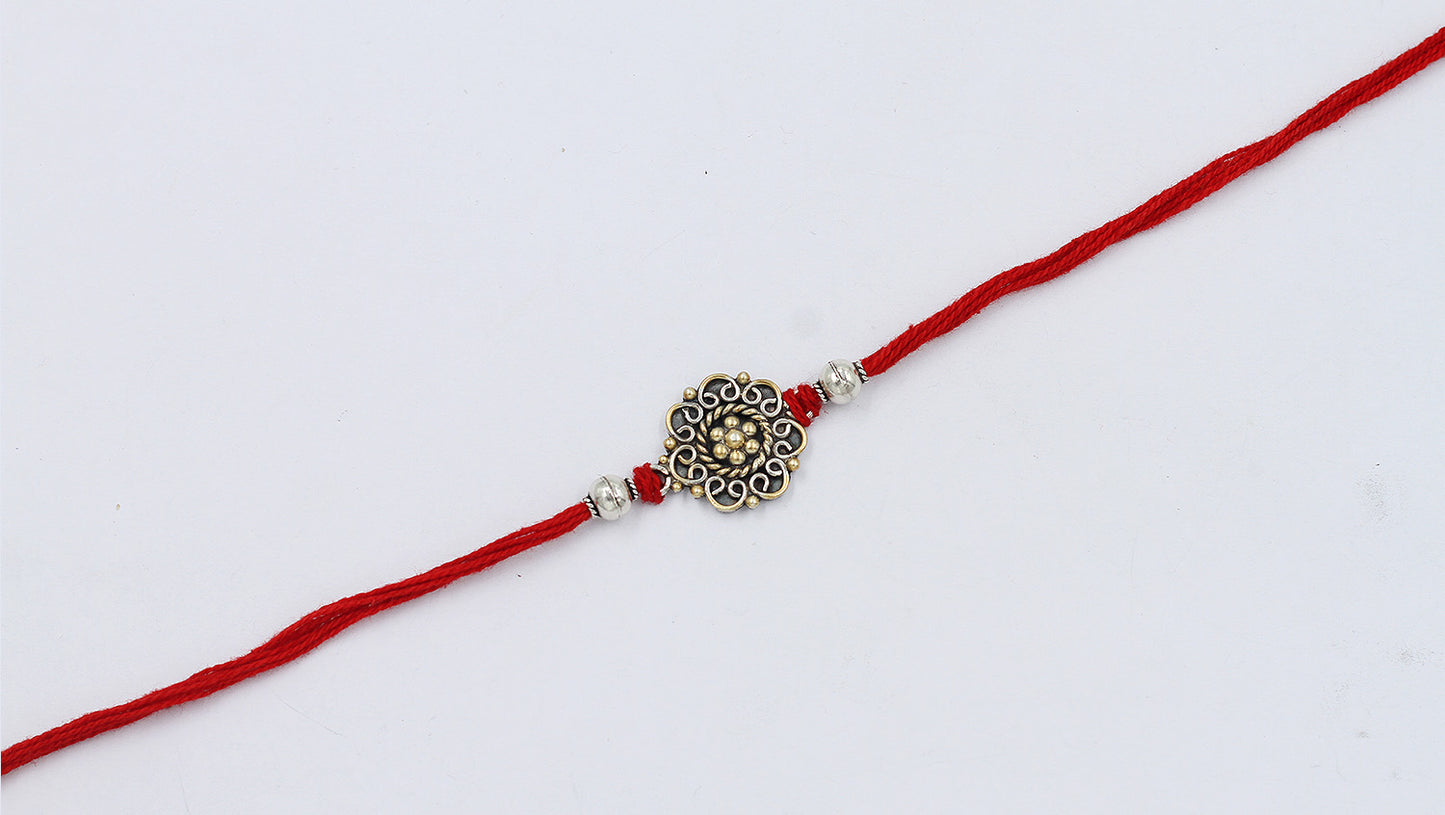 Sangeeta Boochra "925 Sterling Silver Rakhi: Timeless Bond"