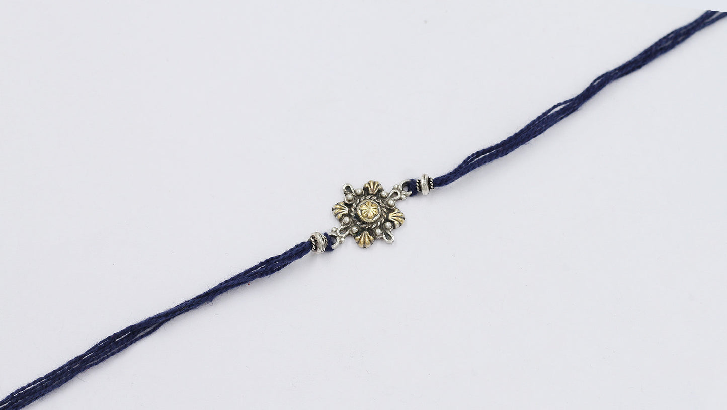 Intricate Silver Rakhi with Om Symbol Silver Rakhi with Amethyst Embellishment Modern Silver Rakhi with Abstract Design