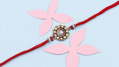 Sangeeta Boochra "925 Sterling Silver Rakhi: Timeless Bond"