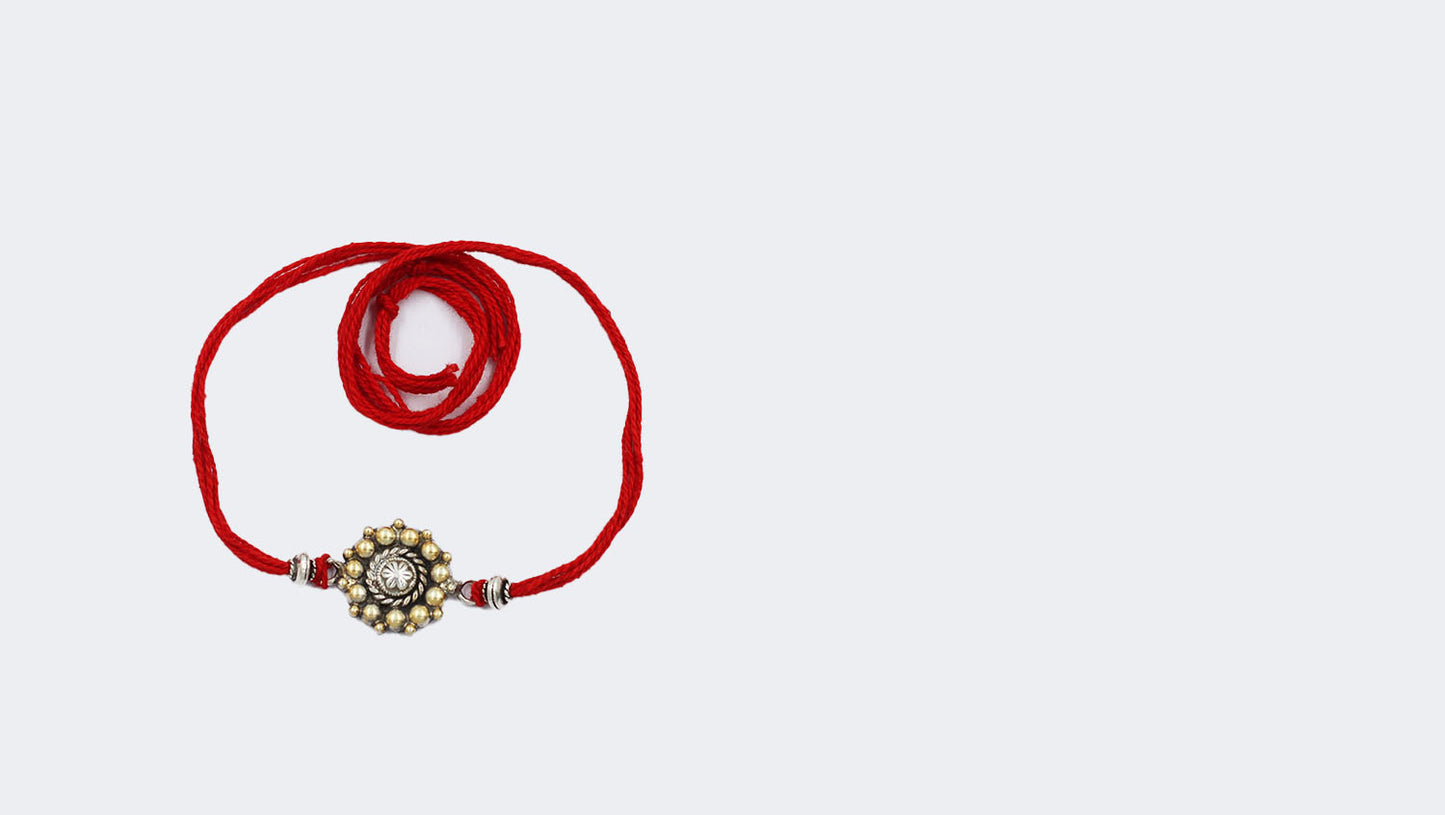 Sangeeta Boochra "925 Sterling Silver Rakhi: Timeless Bond"