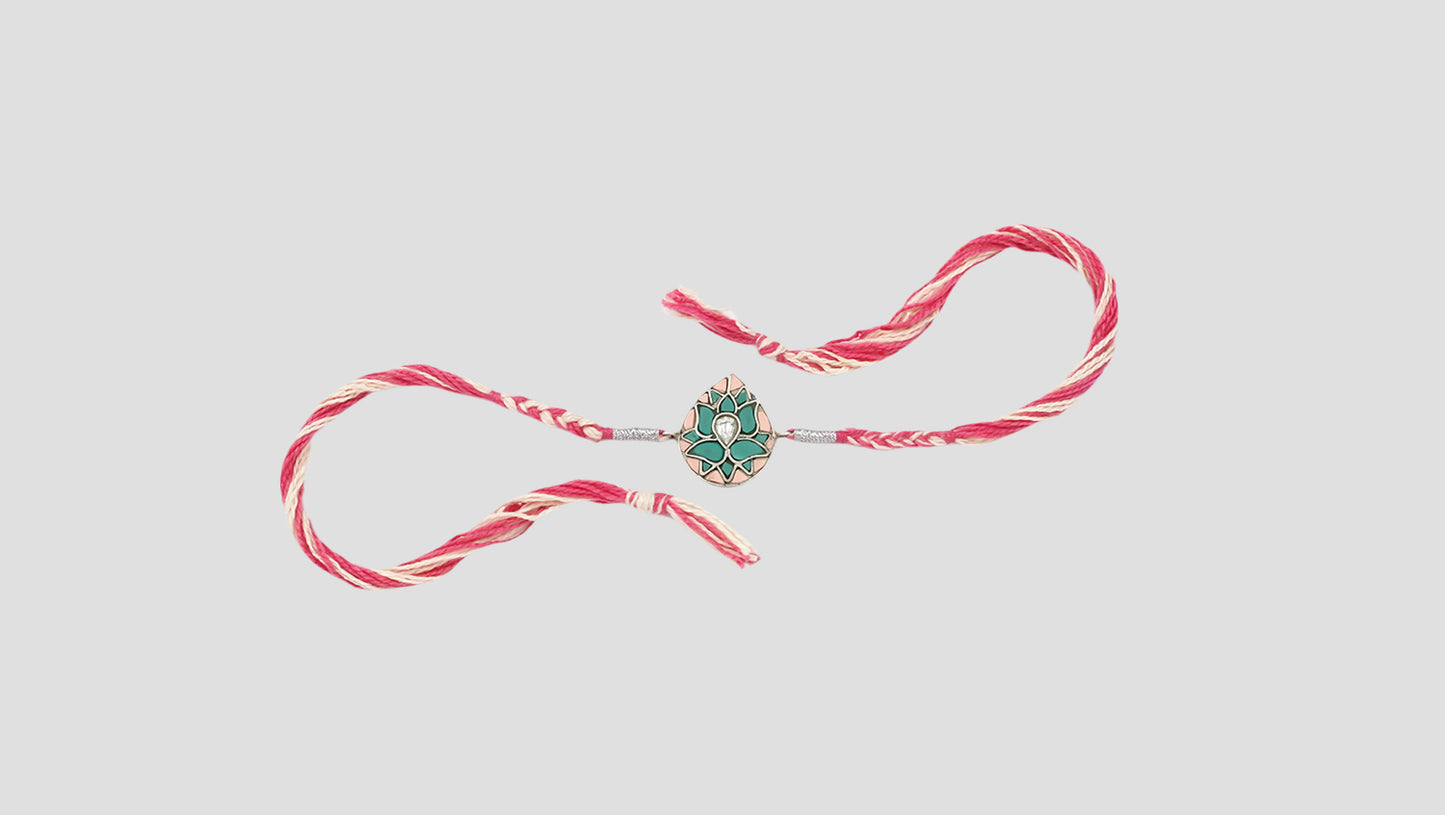 "Lotus Grace Silver Rakhi by Sangeeta Boochra"