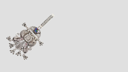 Regal Keepsake: Sangeeta Boochra Ornate Silver Keychain