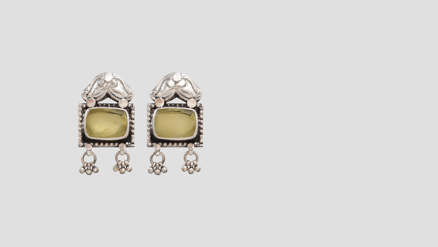 "Classic Splendor: Handcrafted Silver Studs by Sangeeta Boochra "