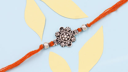 Sangeeta Boochra "925 Sterling Silver Rakhi: Timeless Bond"