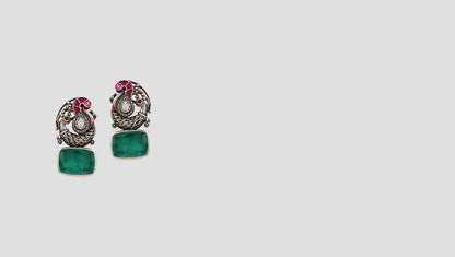 Royal Charm: Handcrafted Silver Earrings with Emerald Stones