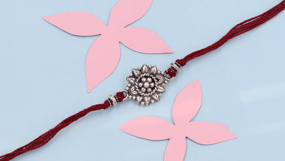 Sangeeta Boochra "925 Sterling Silver Rakhi: Timeless Bond"