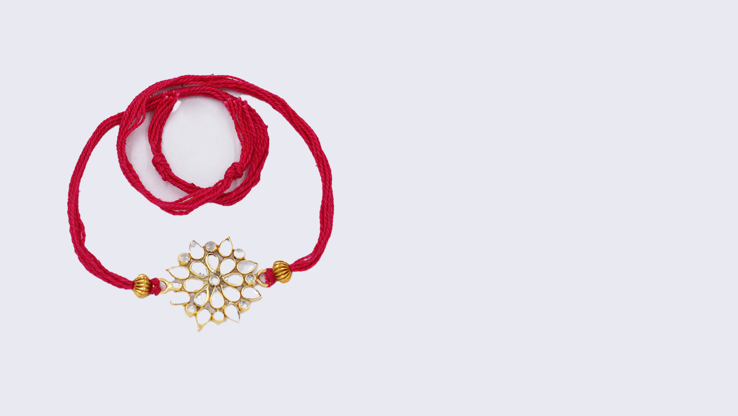 Sangeeta Boochra "925 Sterling Silver Stone-Studded Rakhi: Timeless Bond"