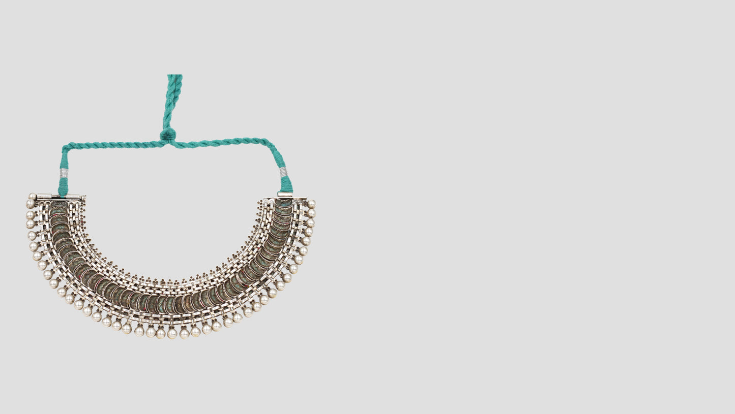 Handcrafted Tribal Silver Necklace with Turquoise Accents