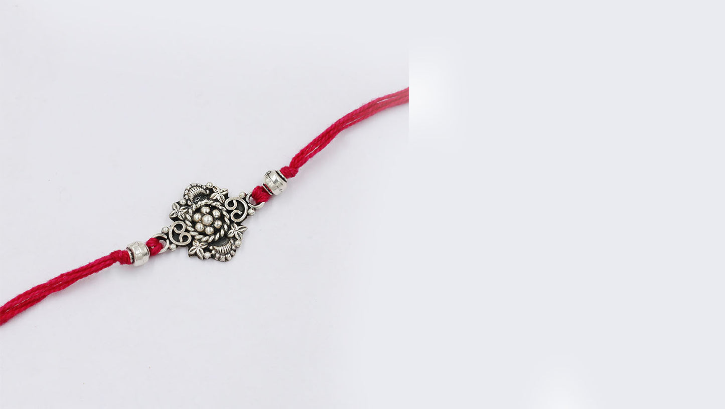 Silver Rakhi with Floral Motif