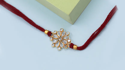 Sangeeta Boochra "925 Sterling Silver Stone-Studded Rakhi: Timeless Bond"