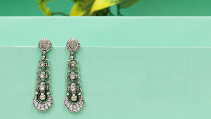 Artisanal Long Silver Earrings with Floral Motifs