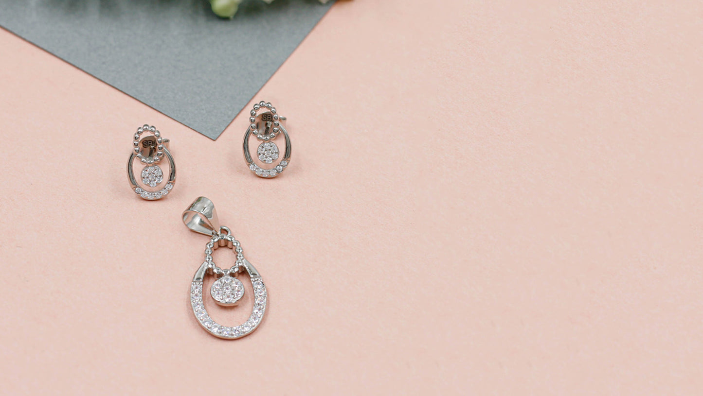 Ethereal Glow CZ Stud Earrings & Chain Pendant Set