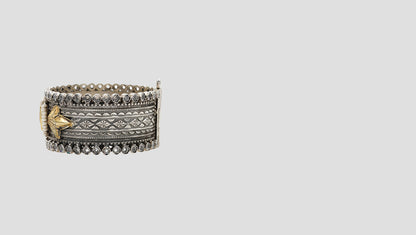 Regal Grace: Handcrafted Silver Bangle with Gold Leaf Detailing