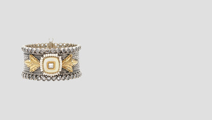 Regal Grace: Handcrafted Silver Bangle with Gold Leaf Detailing