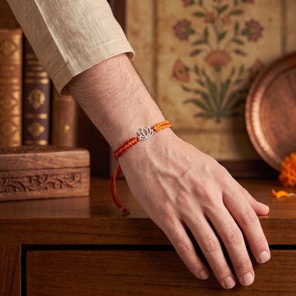 925 Sterling Silver Lotus Rakhi with Red & Orange Thread | Sangeeta Boochra