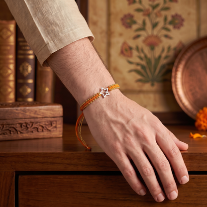 925 Sterling Silver Star Rakhi with Orange Thread | Sangeeta Boochra