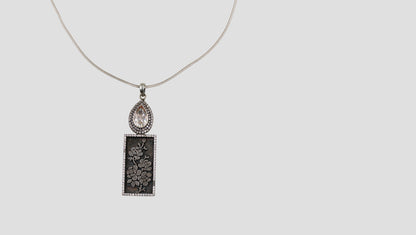 Sangeeta Boochra Designer Oxidised Silver Pendant with Floral Engraving & Moissanite