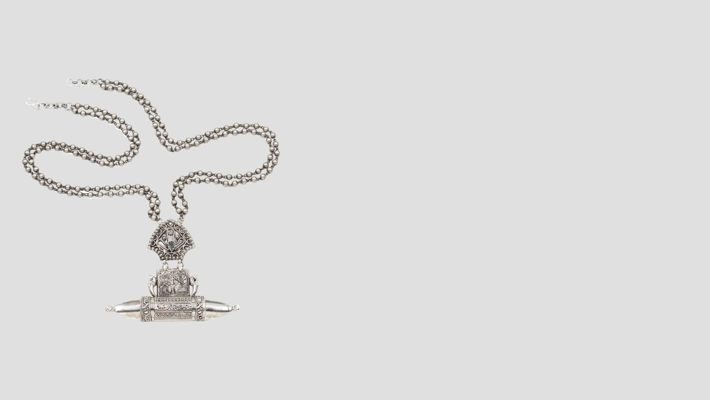 "Heritage Charm: Sangeeta Boochra Handcrafted Silver Pendant"